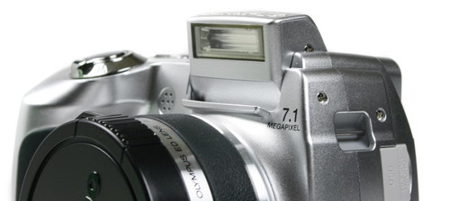  Canon SX100 IS  Olympus SP-510UZ