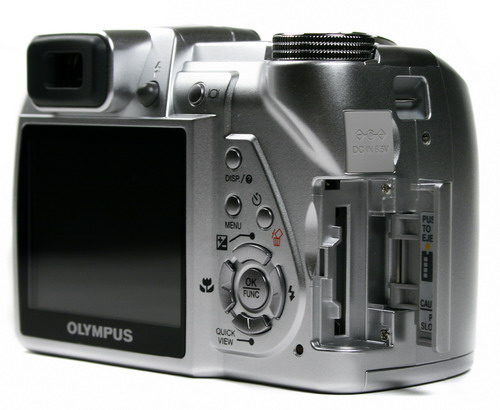  Canon SX100 IS  Olympus SP-510UZ